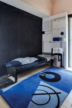 Living room alcove at E-1027, with restored bookcase and book tray