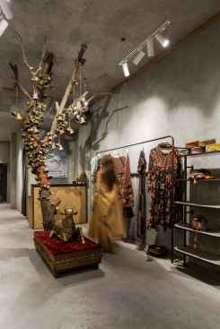 The tree very central part of the store stands tall a bare tree from which are hung bells of various style in brass. The thread is also of Indian cultural identity. The saffron thread suspends each bell from the tree and also spiral around it to remind one of the rituals that are deeply rooted in the Indian culture. This central attraction is the first thing you see when you approach the face of the store. Right ahead of it lies the Nandi, the mount for Lord Shiva. It greets one sitting grandly on the wooden pedestal. It is cast in brass and gives the store a touch of royal essence.