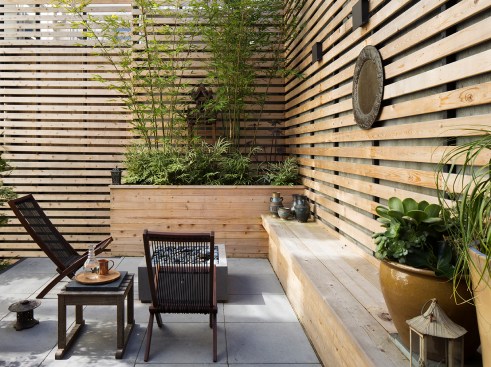 The terraced garden outside the bedroom extends the interior space. 