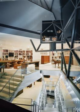 A dramatic stair line with 3,000 Swarovski crystals and topped with a heliostat to gather light and bring it deep into the interior of the five-story space is the central feature of the new Diane von Furstenberg headquarters in New York.