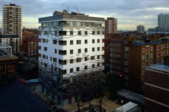 The patterning of the tiles on the exterior of the building is based on the play of shadows on the site from surrounding buildings and trees. The tiles are a fake slate product that uses wood pulp as one of the main ingredients. Ceramic tiles, Anthony Thistleton notes, would have used as much carbon to fire as the project saved by using the cross-laminated timber that holds the building together.