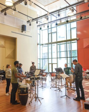 The Instrument Rehearsal Hall's
towering window offers views of the campus and makes it a popular venue for community events.