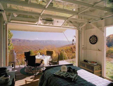 The house features such low-tech solutions as a canvas awning for deck shading and stainless steel sheets and bird spikes for rodent control.