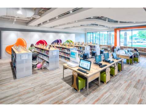 Children's area with sculpted ceiling clouds and "Jelly Bean" reading nooks