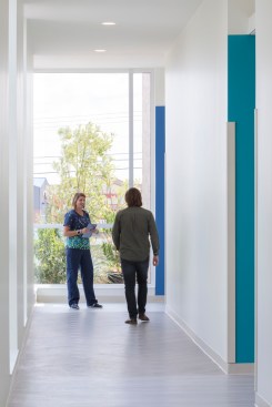 floor to ceiling windows line the corridors
