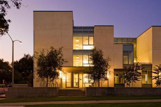 The buildings exterior design is similar in color, materials, and massing, but the fenestration creates a more modern feel.