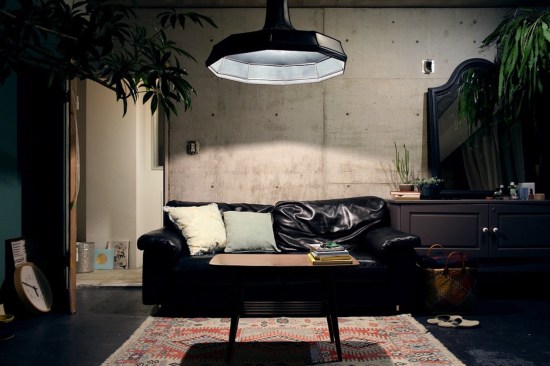 The original wall texture was supposed to be plaster, but the client liked the look of raw concrete during the construction