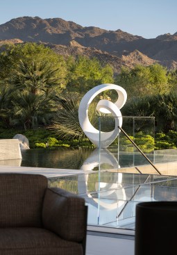 Serenity Indian Wells luxury resort style desert home swimming pool sculpture and views