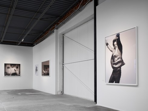 A+view+of+the+southeast+corner+of+the+main+gallery+showing+the+historic+service+%09door+and+the+existing+concrete+floor.++