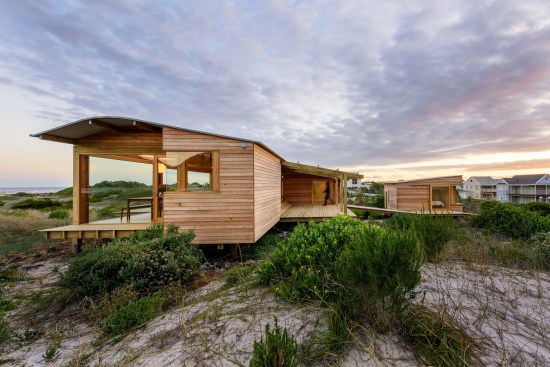 The volumes hover above the landscape allowing the indigenous vegetation to take hold beneath. The
owners are actively involved with rehabilitation and protection of the surrounding dunescape assisting
conservationists