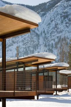 A blanket of snow trapped atop the butterfly roofs provides extra insulation.