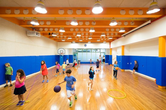 Inside+the+new+gymnasium+which+doubles+as+an+auditorium+for+presentations.