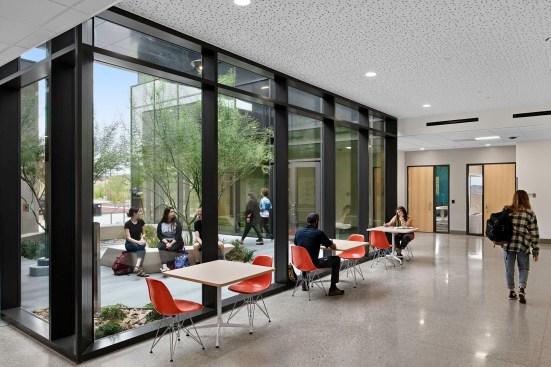 Critical to learning is the connection to daylight and nature. The building is 
planned along the east-west axis allowing for 90 percent of the educational 
spaces to connect directly to the exterior. Further, sunken courtyards, a deck and a semi-internal courtyard introduce nature processionally through the 
project.