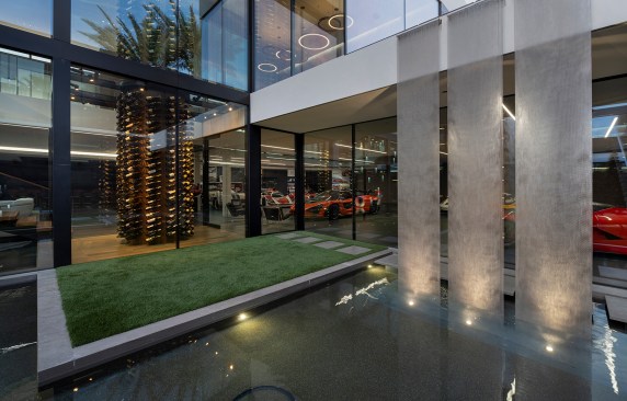 Serenity Indian Wells  modern architectural mansion with luxury glass walls & Richard Erdman sculptures