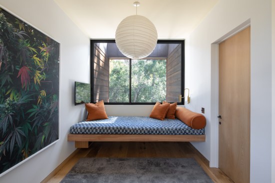The "Perch," with a custom Eucalyptus built-in daybed tucked between bedrooms, allows for a unique and quiet spot perfect for meditation, lounging, and gazing into the trees.
 