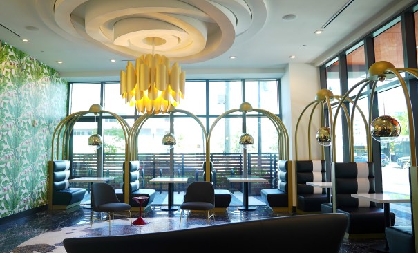 This custom pendant was built for the communal space to reflect vintage Miami design. 