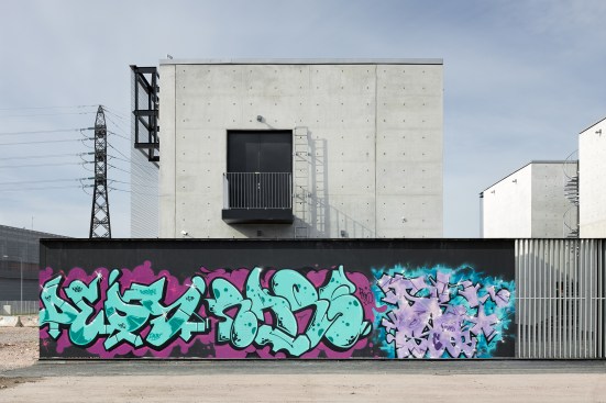 A nearly 10-foot-high blank aluminum fence surrounds the substation on three sides, purposefully providing a canvas for local artists.