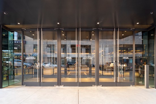 Ellison Bronze balanced doors – extruded aluminum, narrow stile (painted black)