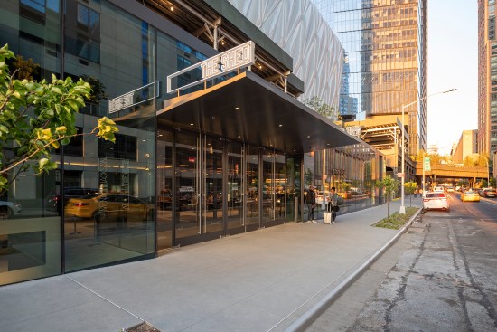 Ellison Bronze balanced doors – extruded aluminum, narrow stile (painted black)