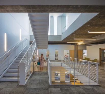 Staircase in fifth-floor office space, leading to rooftop conference room
