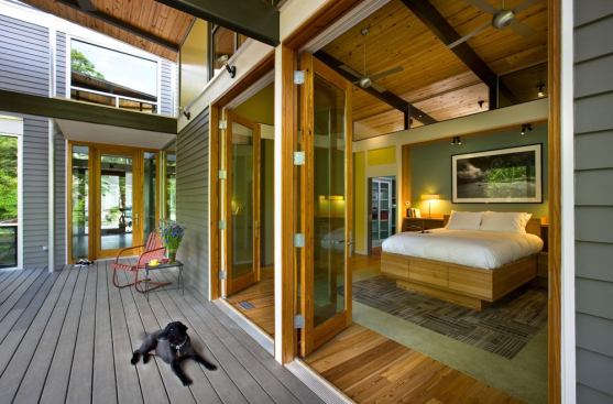 The master bedroom opens onto a large covered deck.