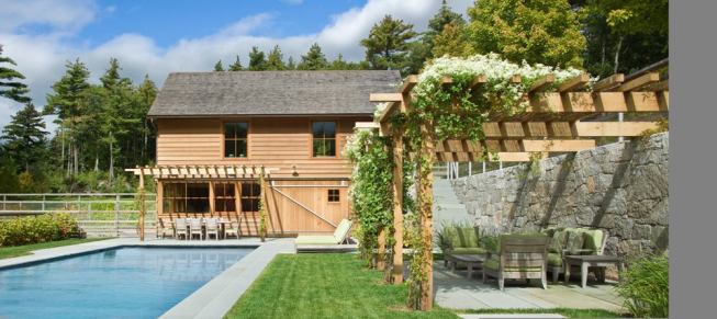 The pool house provides garden storage at the courtyard level and changing rooms and a kitchen below.