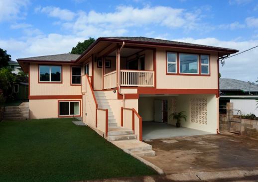 This five-bedroom home was rebuilt after the original dwelling nearly burned to the ground because of an electrical fire.