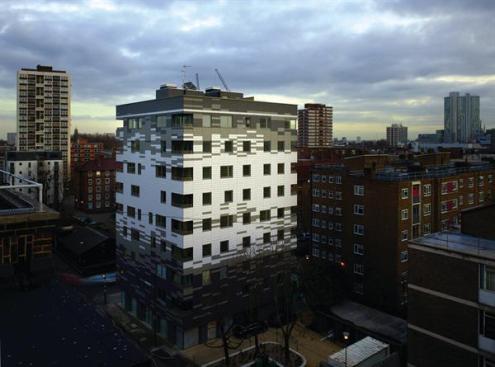 The patterning of the tiles on the exterior of the building is based on the play of shadows on the site from surrounding buildings and trees. The tiles are a fake slate product that uses wood pulp as one of the main ingredients. Ceramic tiles, Anthony Thistleton notes, would have used as much carbon to fire as the project saved by using the cross-laminated timber that holds the building together.