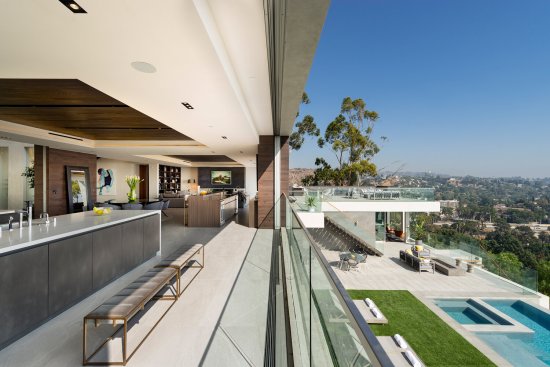 Outdoor terrace kitchen with views of the Hollywood sign at the Los Tilos house.
