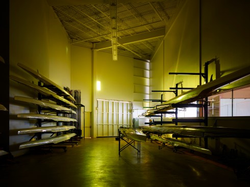 The Boat Storage Room is lighted as if the space is a pinhole camera.  One gold 
“note” illuminates the entire space. “Notes” appear, move, change and disappear during the day capturing the kinetic energy within the space.
