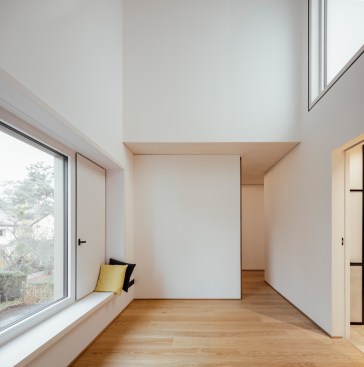 Each of the three bedrooms becomes a cosy place to stay thanks to an elongated seating window.