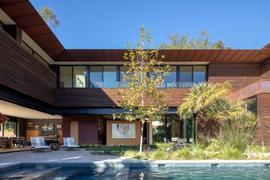 Landscape designer, Case Fleher, introduced lush plantings that reflect the vibe of the canyon, blending native species along with impressive specimens found on the original site, such as the Chamaerops seen on the right side of the picture.