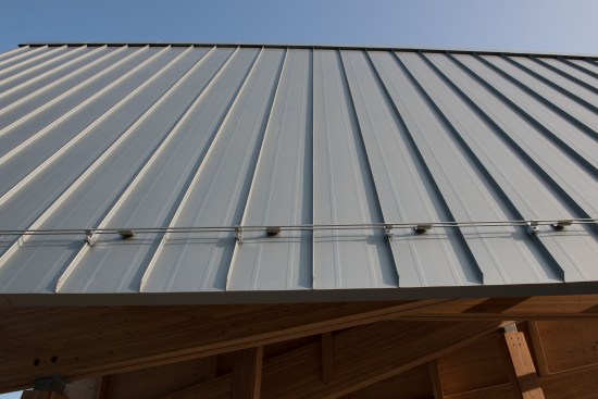 "We sought out zinc for its naturally weathering patina, which will develop over time. We specifically chose the prePATINA blue-grey RHEINZINK to encourage this process,”