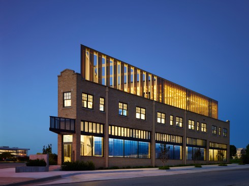 The classic flatiron view including the new 3rd floor addition and enhanced main entry door canopy. 