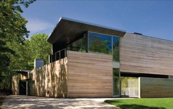 The walled front elevation affords a sense of quiet and seclusion.