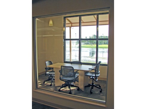 View through large study room of lake
