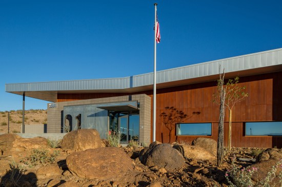 Existing boulders were saved and relocated, permeon color was used to match existing. 