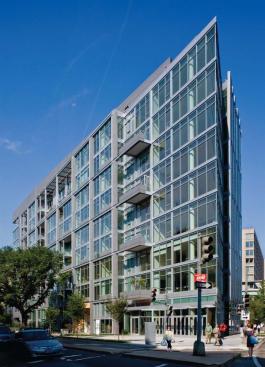 The bar-shaped building responds to its context with ground-floor retail on the busy M Street and 22nd Street sides. 