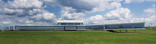 The west fa?ade, facing a wetlands area, is almost entirely glass, maximizing daylight inside and views out. The horizontality of the structure is emphasized by what Metter refers to as 'brows,' thin concrete projections that run along the top and bottom of the single-story main building and cantilever beyond the end of the window wall.