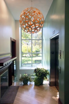 The double-height entry leads to the future children’s library and reading rooms above