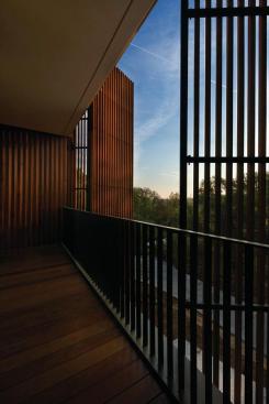 The house's ipe screen includes two movable 10-foot sections that can open the house to the outdoors.