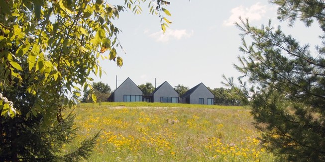 Exterior distant view from across west prairie. 