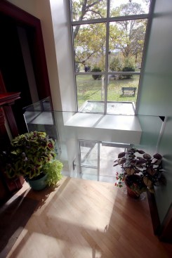 The main level lobby frames views of the entrance and Veterans Park