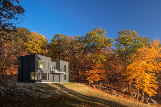 With changing fall colors on full display, the home represents a conscious departure from city life and a new focus on healing, living simply, and appreciating nature. 
