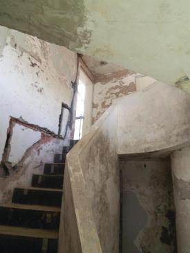 The sculptural stairway before.