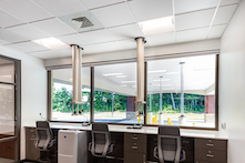 Providing consistent quality across multiple applications, Rockfon's complete ceiling solution creates a contemporary and comfortable financial service facility for SECU's staff and member clients.