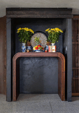 the altar will be hidden behind the bamboo blind, when the owner closes it