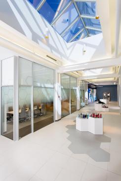 Visitors to the Novelis Global Research & Technology Center enter a light-filled lobby.
