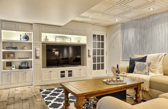 Robert found a motif in Ceilume’s thermoformed Stratford-style ceiling panels, and then picked cabinetry and moldings to match the ceiling.