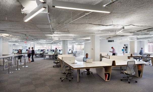 The Link Desk (to the left) and the Radar Desk (to the right) give way to an open office area beyond.